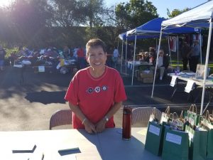 Community Outreach Gloria at Registration Table_2018